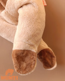 نمای نزدیک از مدل دایناسوری رنگ کرم قهوه ایی